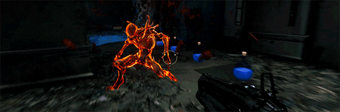 Doom Slayer performing a Glory Kill on an Imp